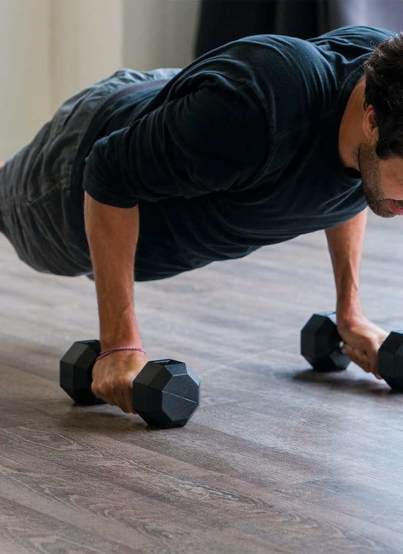 Dumbbell push-up — floor work